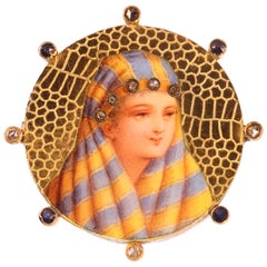 Typical Late 19th Century Gold Enameled Brooch with Bedouin Woman