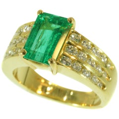 Vintage Kutchinsky 2.33 Carat Natural Emerald and Diamond 18 Karat Yellow Gold Ring