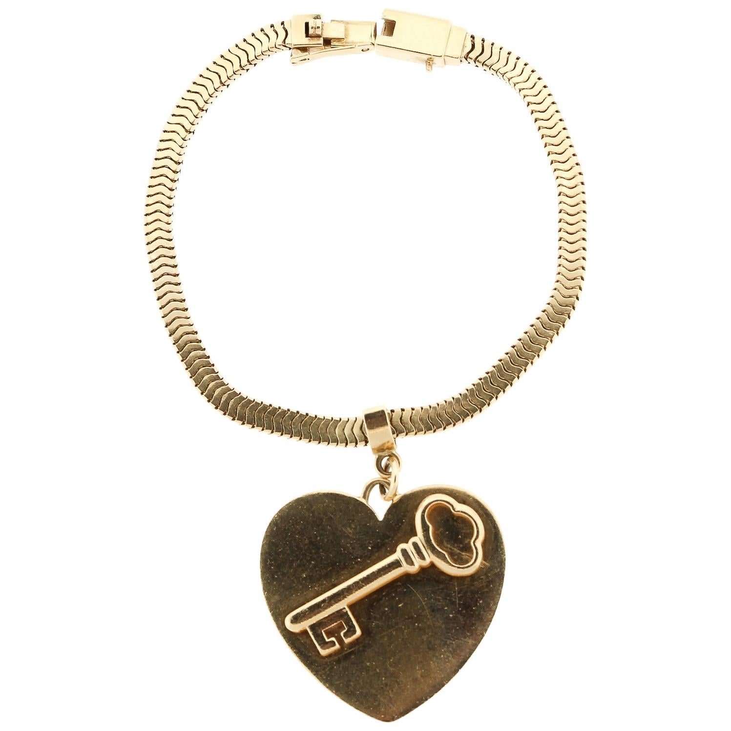 Vintage 1960s 14 Karat Gold Heart Charm Bracelet by Tiffany & Co.