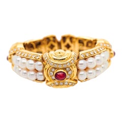 Gold, Cultured Pearl, Cabochon Ruby and Diamond Bangle Bracelet