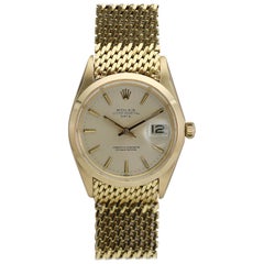 Rolex 18 Karat Yellow Gold Date Ref 1500 on Rolex Gold Mesh Bracelet, circa 1969