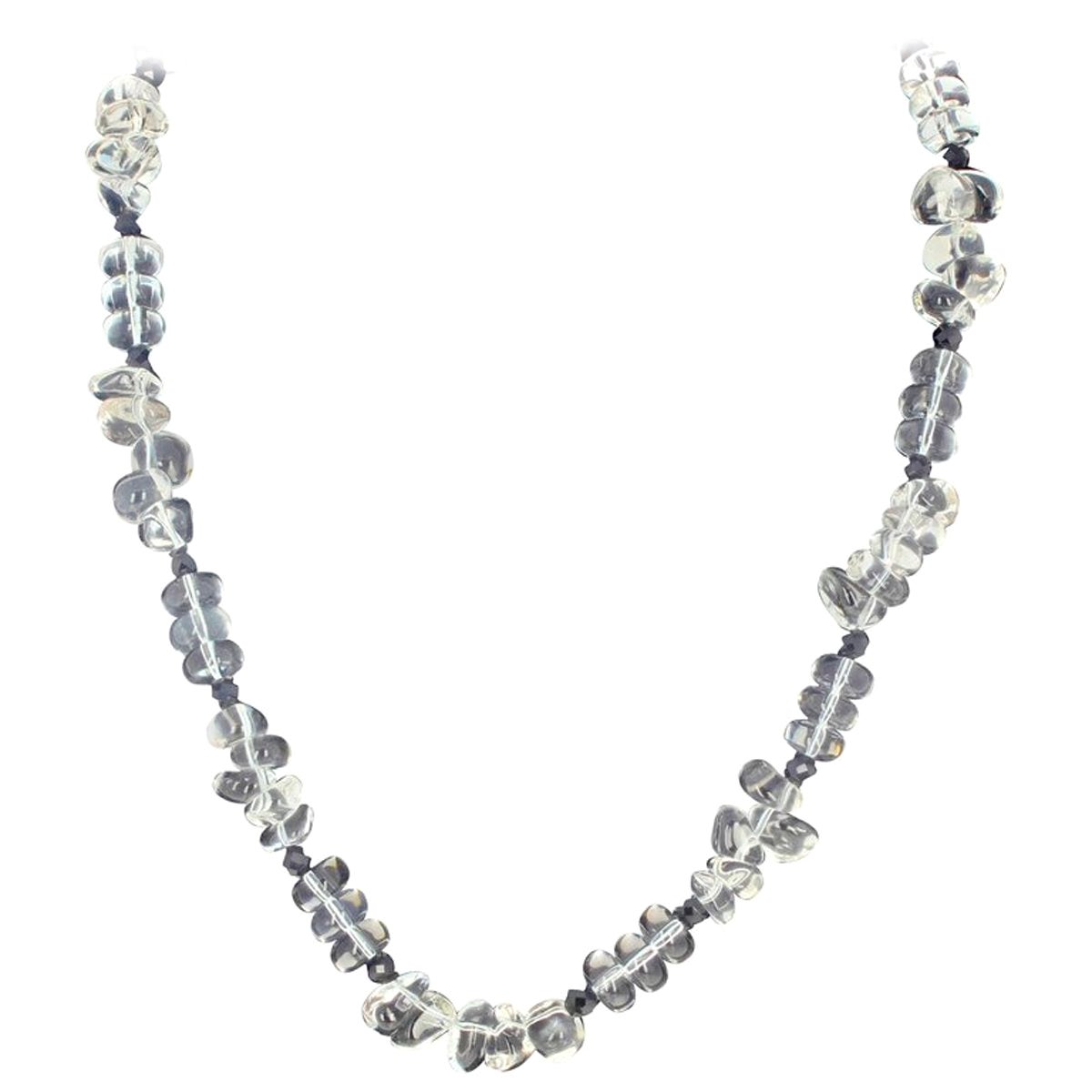 This beautiful 17.5 inches long natural Quartz necklace is enhanced with glittering gem cut black Spinel and set with a darkened sterling silver diamond encrusted hook clasp.  The flip-flop of the gemstones makes it show off romantically.  It