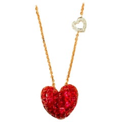 Used 18 Karat Rose Gold Ruby and Diamond Heart Pendant in Invisible Setting