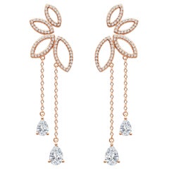 Boucles d'oreilles en goutte en or rose 18 carats avec diamants