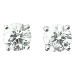 Tiffany & Co. .77 Carat Platinum and Diamond Stud Earrings H VS1 