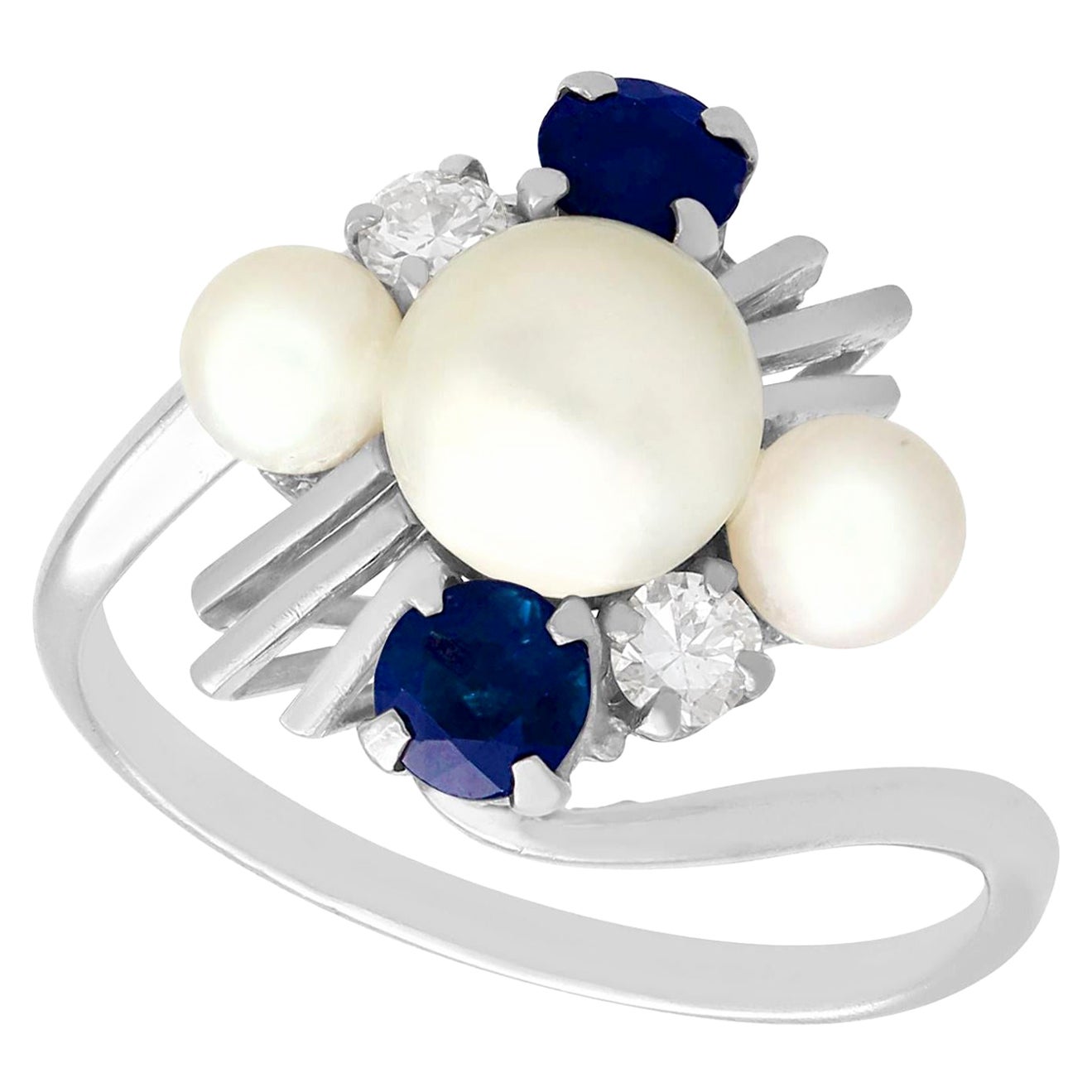1970s, Pearl and Sapphire Diamond and White Gold Twist Ring