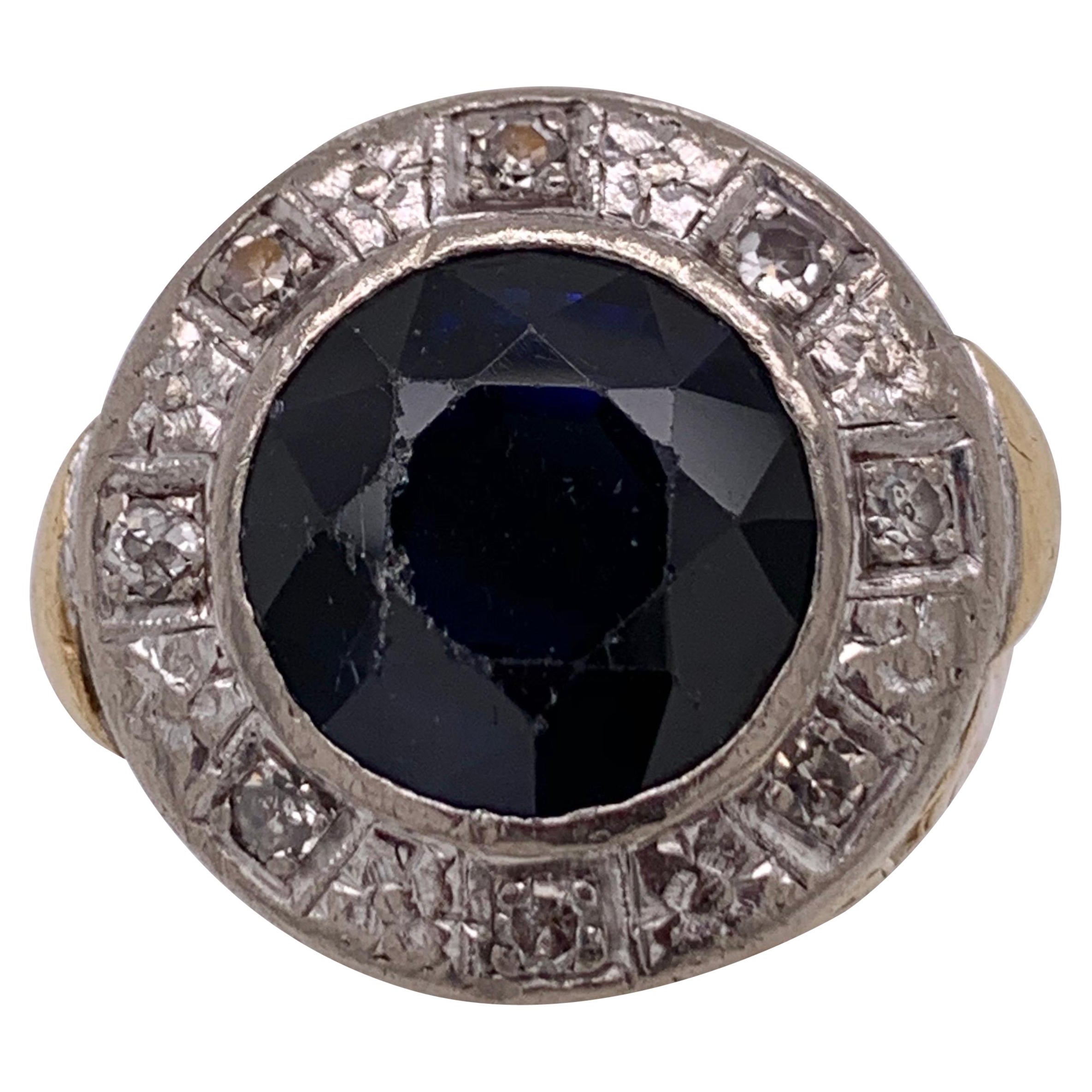 Anello in oro bicolore Diamanti affiancati da uno zaffiro in vendita