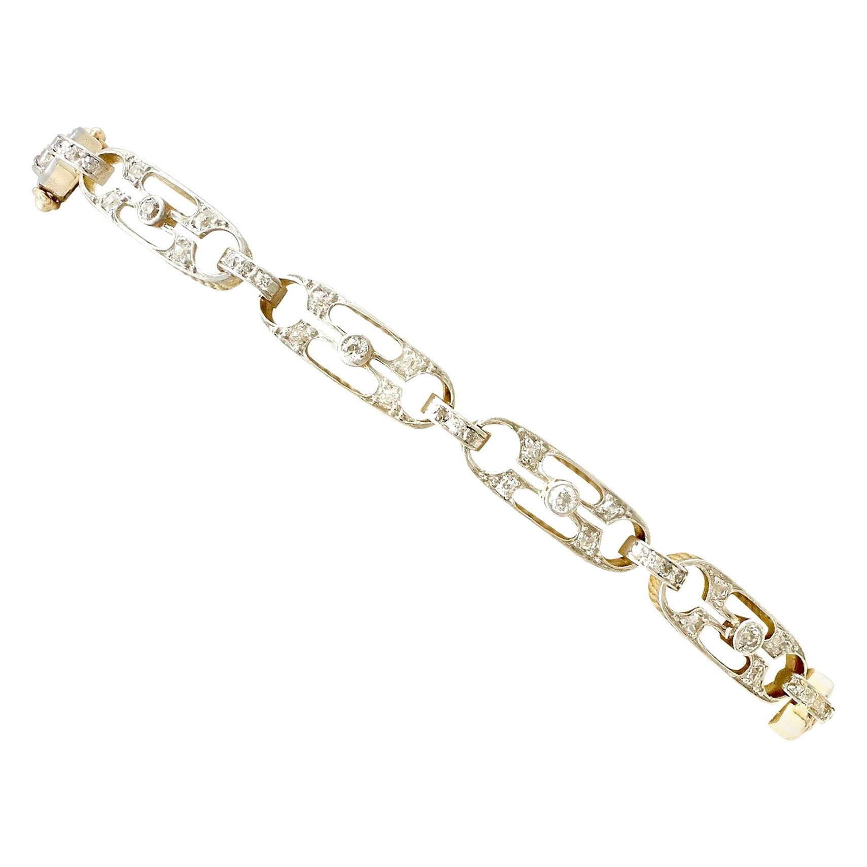 Bracelet ancien serti d'un diamant de 1,05 carat et d'or jaune et de platine