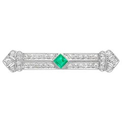 1930s, Emerald 1.29 Carat Diamond Platinum Brooch
