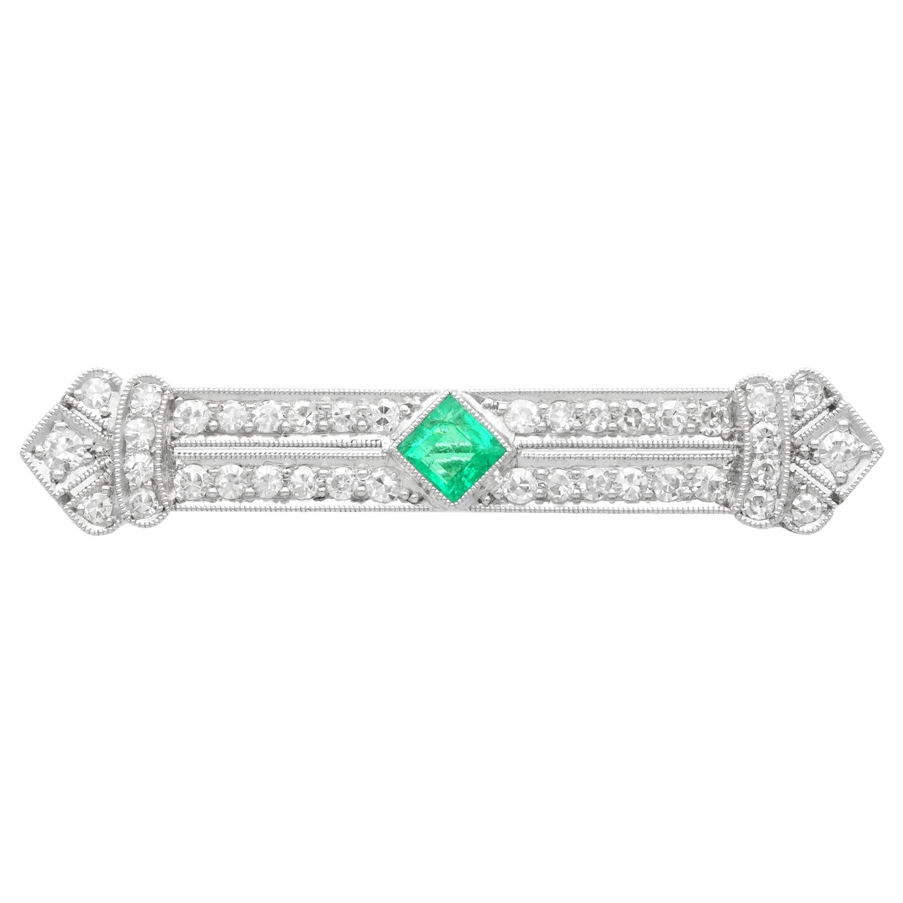Antique Art Deco Emerald and 1.29 Carat Diamond Platinum Brooch