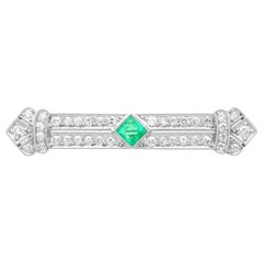 Antique Art Deco Emerald and 1.29 Carat Diamond Platinum Brooch