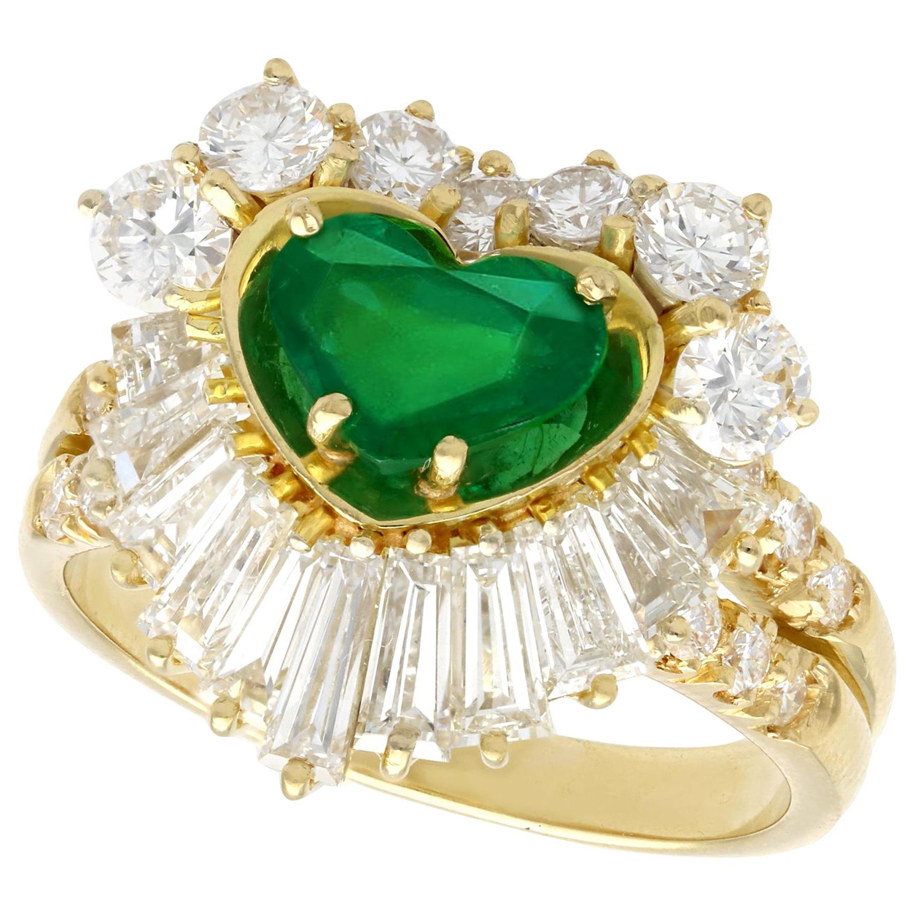 A stunning vintage 1.63 carat Zambian emerald and 2.31 carat diamond, 18 karat yellow gold cocktail ring; part of our diverse vintage gemstone jewelry collections

This stunning, fine and impressive emerald ring has been crafted in 18k yellow