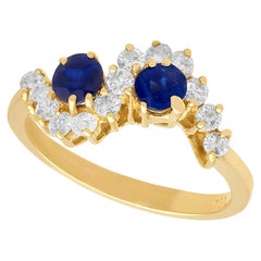 Vintage 1990s Sapphire and Diamond 18K Gold Twist Ring