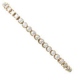 Contemporary 6.36 Carat Diamond and Yellow Gold Tennis Bracelet