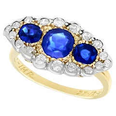 Anillo antiguo de oro amarillo con zafiro de 1,48 quilates y diamante de 1,04 quilates