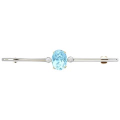Antiguo broche de barra de oro amarillo de los años 20 con aguamarina y diamantes de 2,27 quilates
