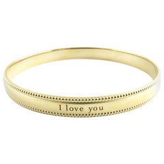 Tiffany & Co. 18K Yellow Gold "I Love You" Bangle Bracelet