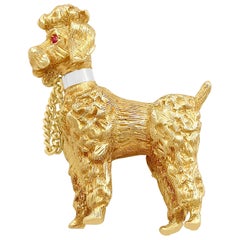 Broche caniche vintage de oro amarillo de los años 60