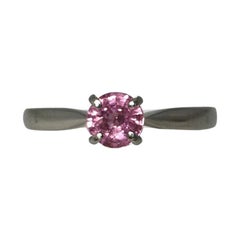 Vivid Purple Pink Unheated Sapphire Platinum Solitaire Ring 0.65 Carat Round Cut