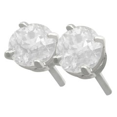 Antique and Contemporary 1.03 Carat Diamond and Platinum Stud Earrings