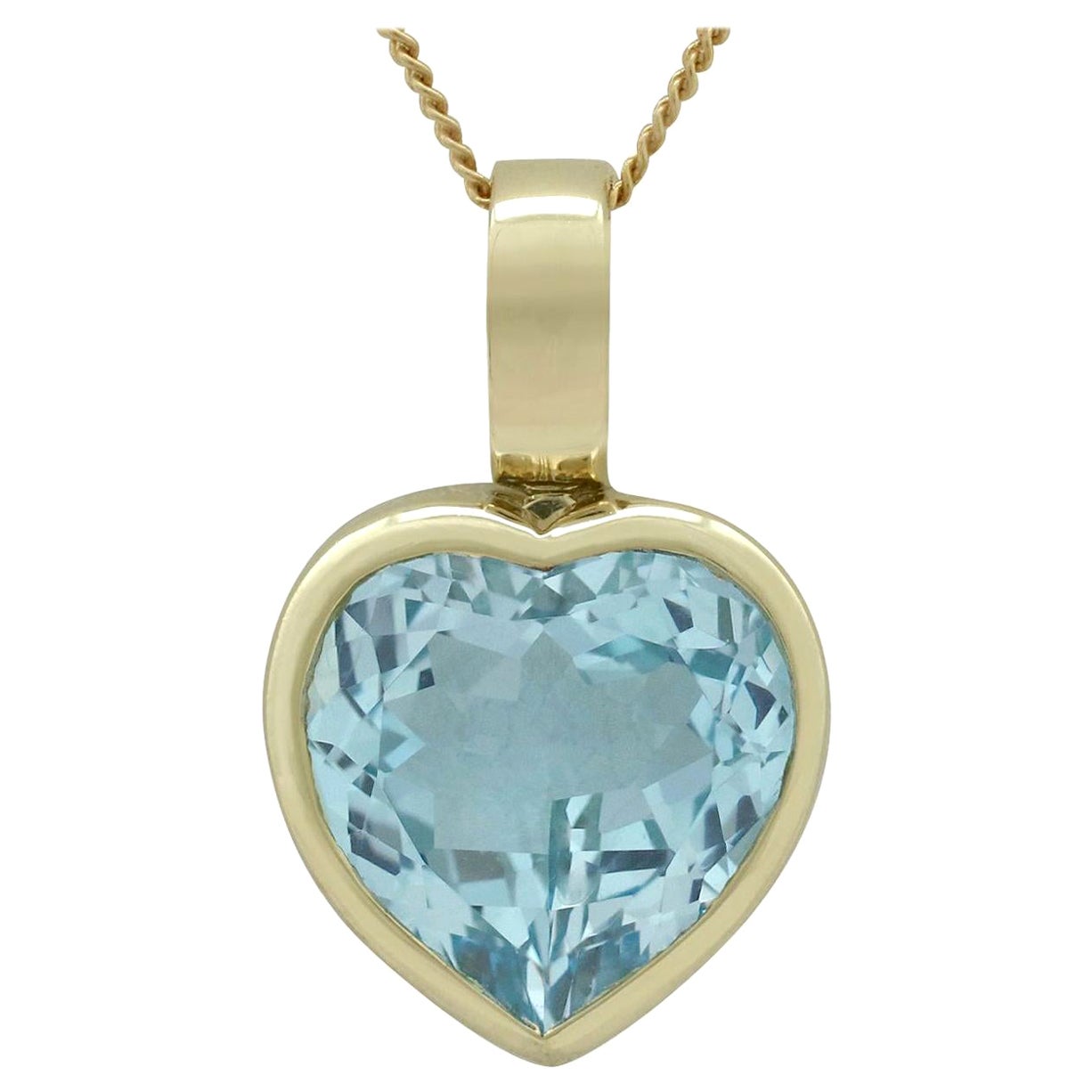 Heart Shaped 10 Carat Blue Topaz Onyx and Diamond Pendant in 9 Carat ...