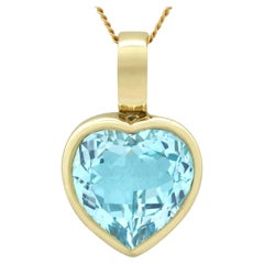 Vintage 1990s 13.50 Carat Blue Topaz and Yellow Gold Heart Pendant