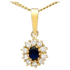 Vintage 1980s Oval Cut Sapphire and Diamond Yellow Gold Cluster Pendant