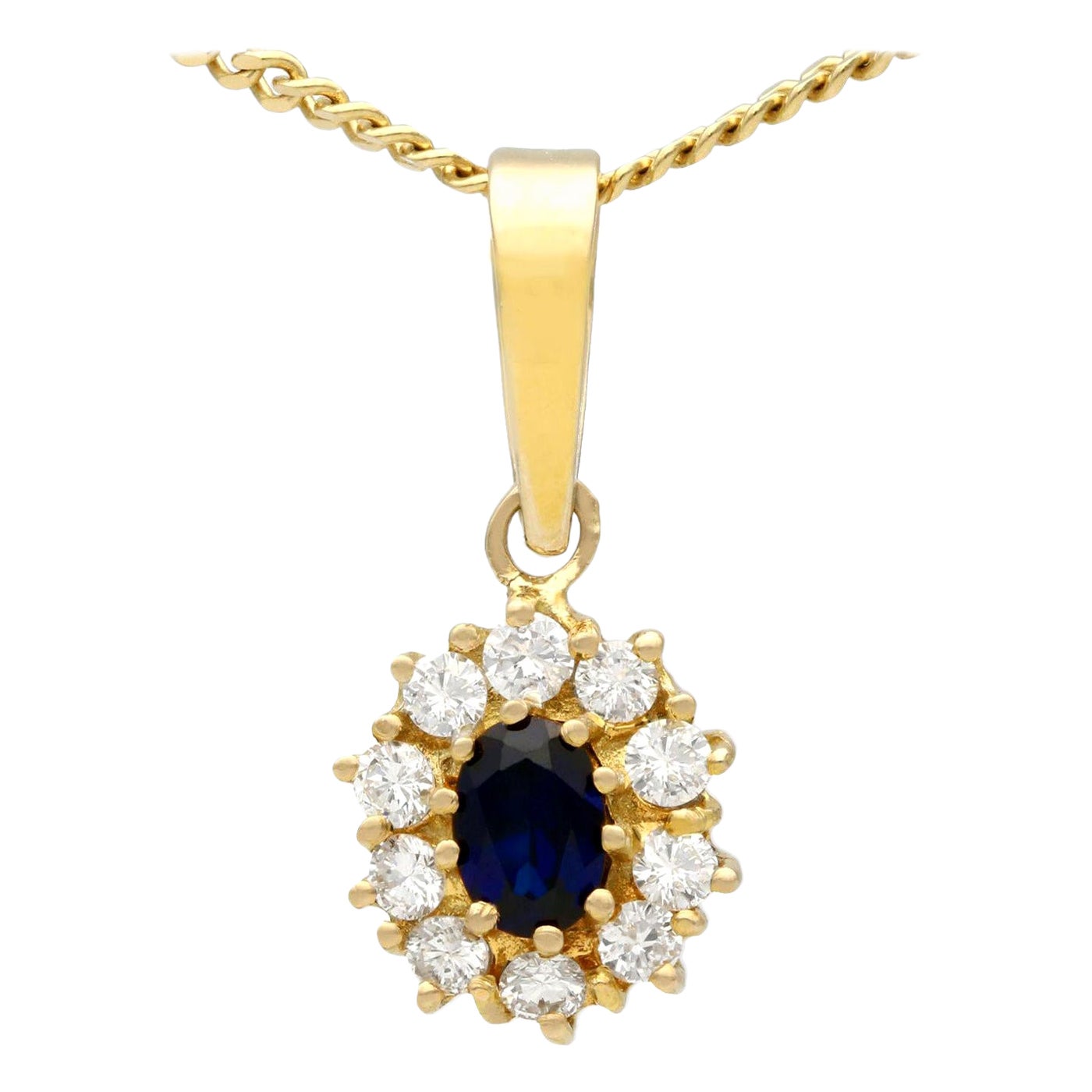 Vintage 1980s Oval Cut Sapphire and Diamond Yellow Gold Cluster Pendant