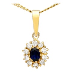 Vintage 1980s Oval Cut Sapphire and Diamond Yellow Gold Cluster Pendant