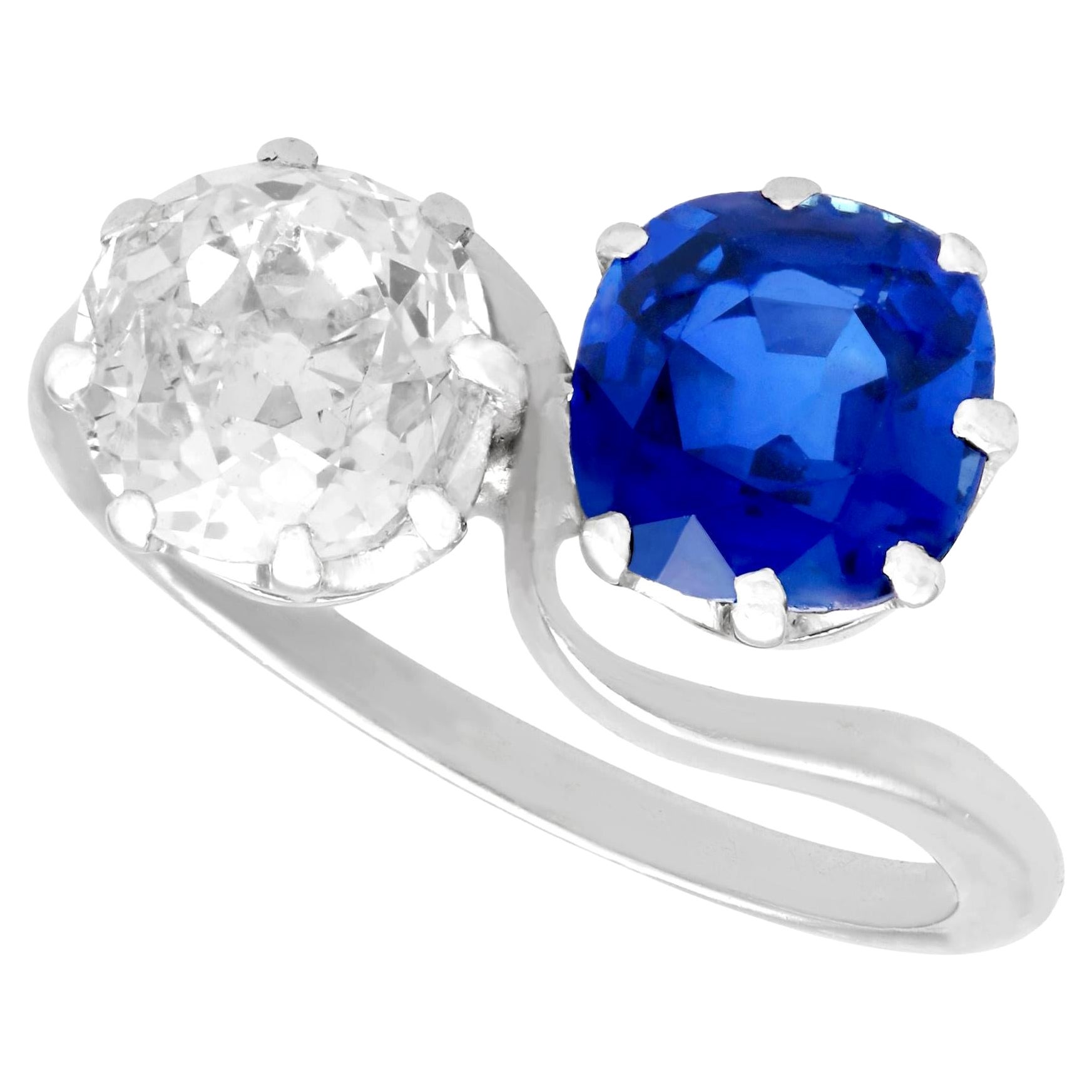 1920s 1.45 Carat Diamond 1.58 Carat Sapphire Platinum Twist Ring For Sale