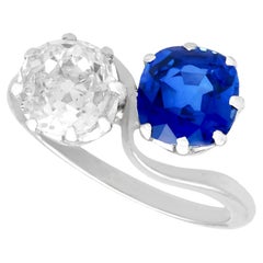1920er Jahre 1,45 Karat Diamant 1,58 Karat Saphir Platin Twist Ring