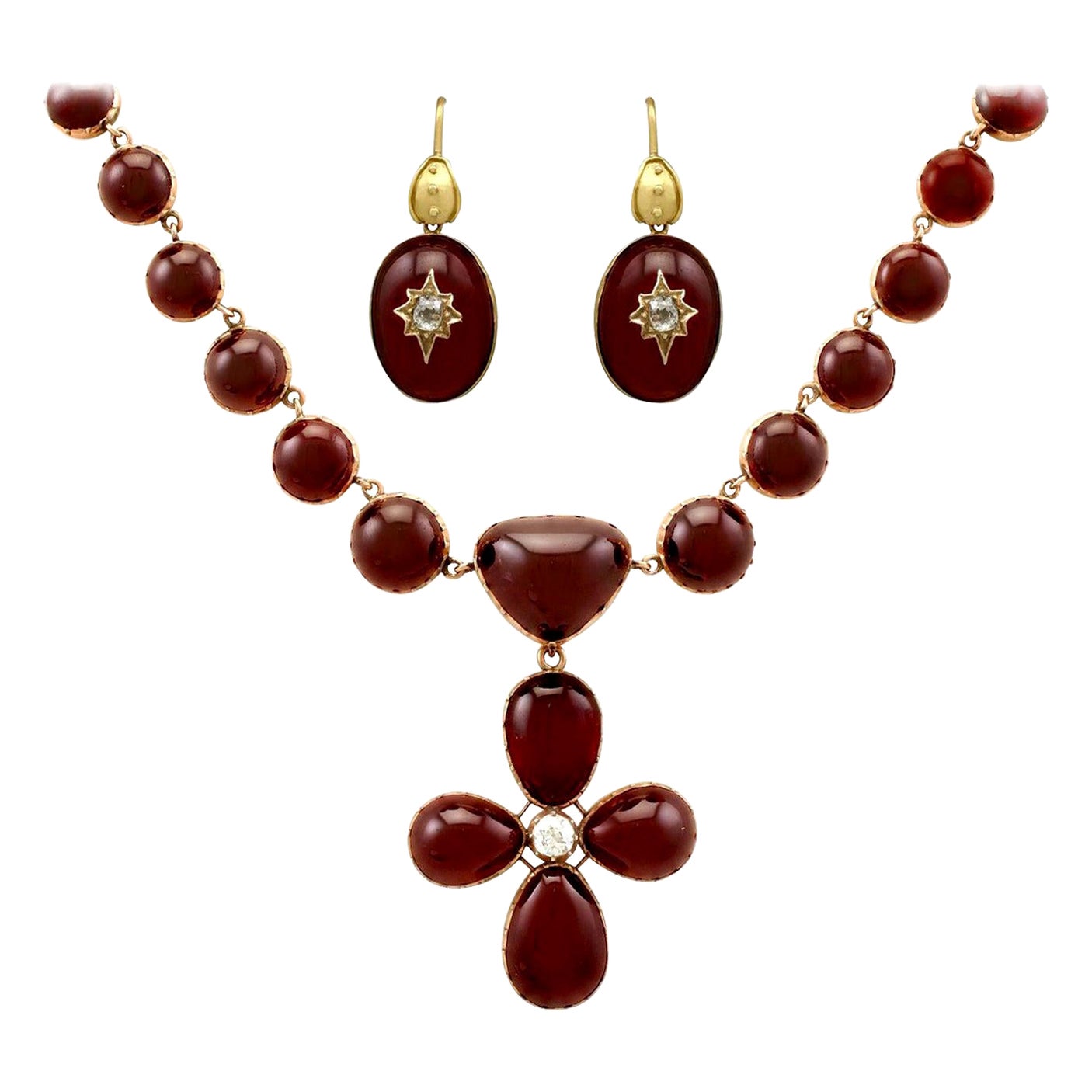 Ensemble de bijoux en or du 19ème siècle en grenat cabochon de 206,60 carats et diamants de 1,49 carat en vente