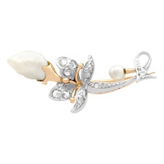 Broche victoriano de oro amarillo con diamantes y perlas barrocas