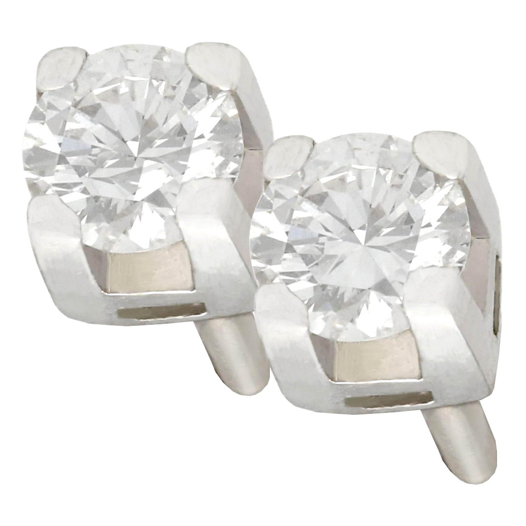 BULGARI Signature Diamond and Gold Stud Earrings at 1stDibs