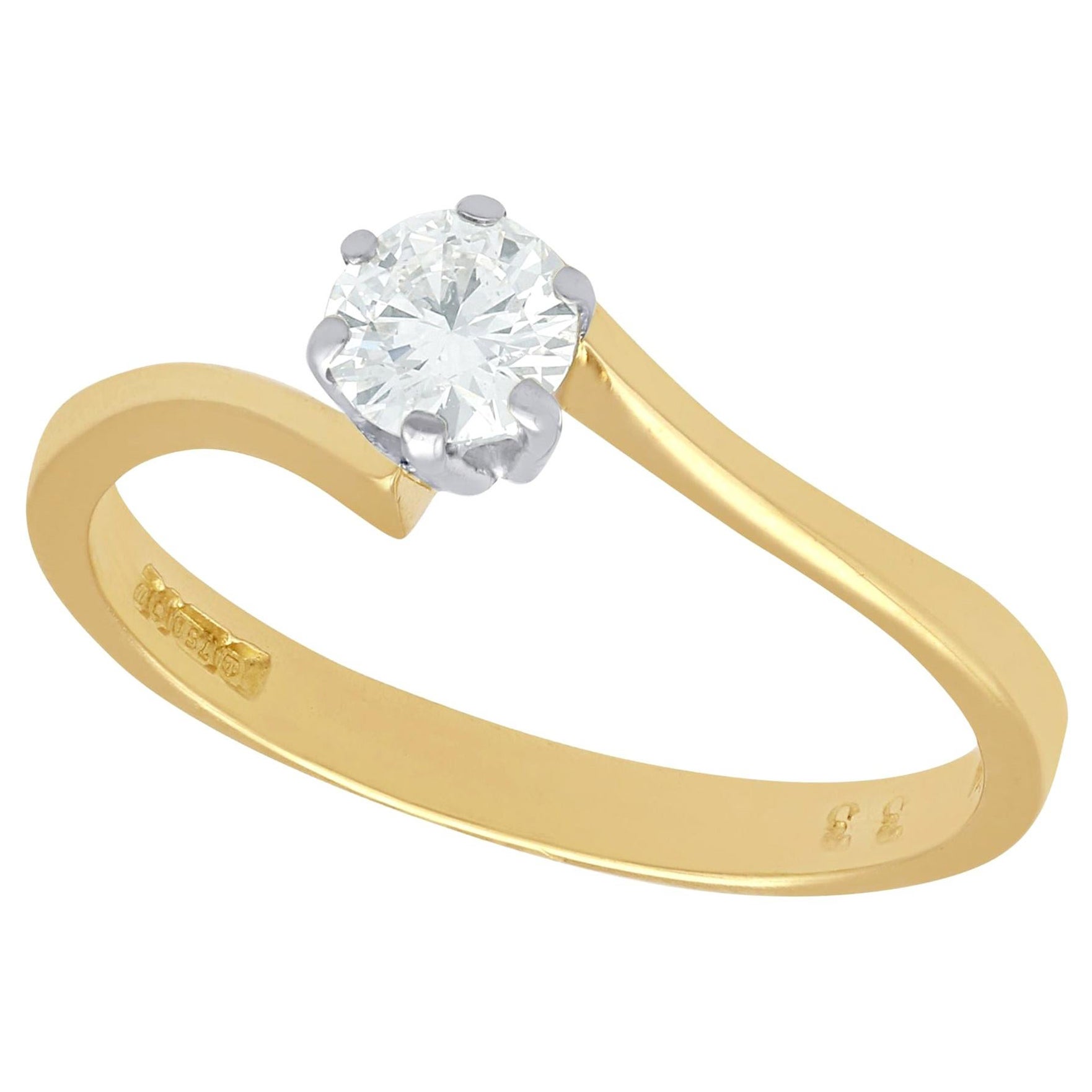 Diamond and Yellow Gold Solitaire Twist Engagement Ring For Sale