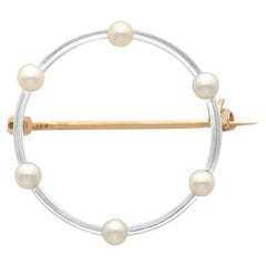 Broche en perles et or jaune 9 carats, sertie de platine, ancienne, vers 1920