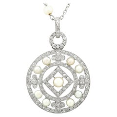 Antique 1920s Seed Pearl and 1.11 Carat Diamond and Platinum Pendant