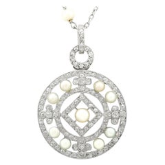 Antique 1920s Seed Pearl and 1.11 Carat Diamond and Platinum Pendant