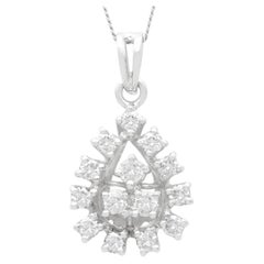Diamond and White Gold Cluster Pendant