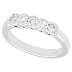 Diamond and White Gold Five Stone Ring