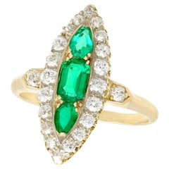Antique Emerald and 1.38Ct Diamond Yellow Gold Marquise Shaped Ring