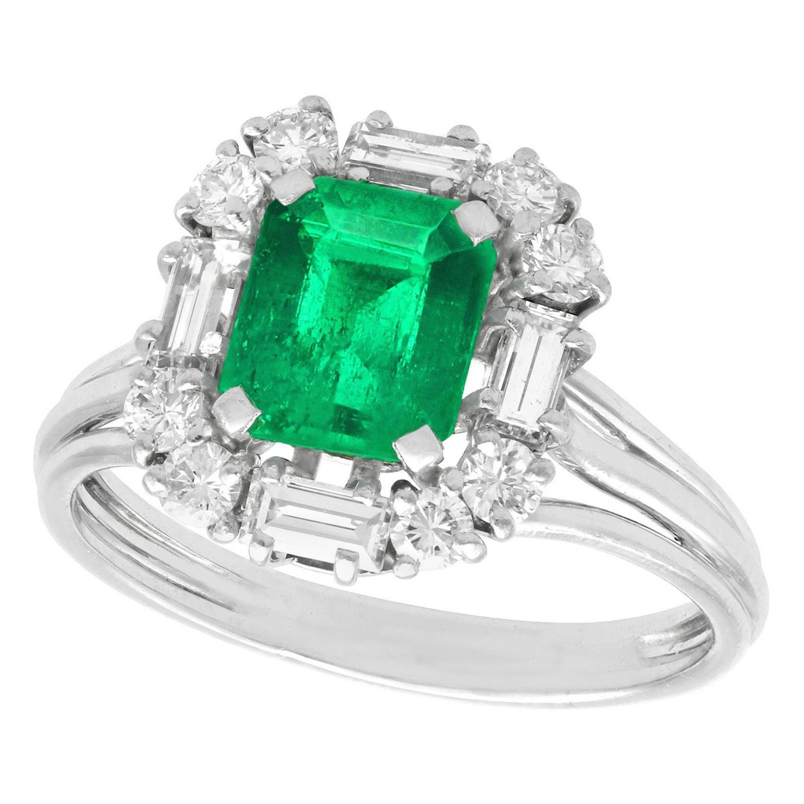 1970s 1.43 Carat Emerald and Diamond Platinum Cluster Ring For Sale