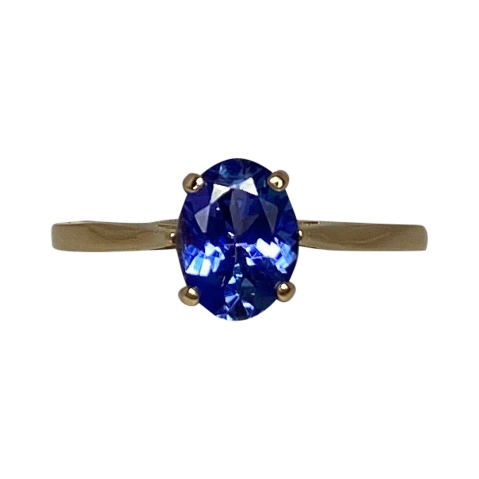 Vivid Blue Violet 1.34 Carat Tanzanite Oval Cut Yellow Gold Solitaire Ring