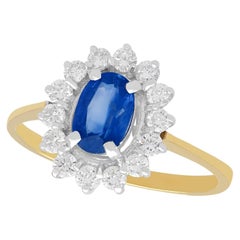 1.45 Carat Oval Cut Sapphire and Diamond Gold Cluster Ring
