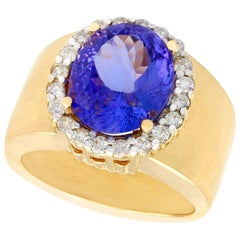 Anello cocktail in oro giallo con tanzanite e diamanti da 5,72 carati