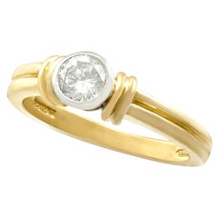 Diamond and Yellow Gold Solitaire Engagement Ring