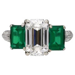 Retro Diamond and Natural Unenhanced Emerald Three-Stone Ring