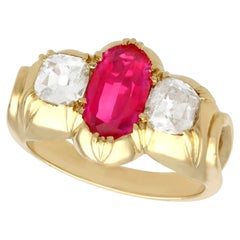 Used 2 Carat Oval Cut Ruby and Diamond Yellow Gold Cocktail Ring