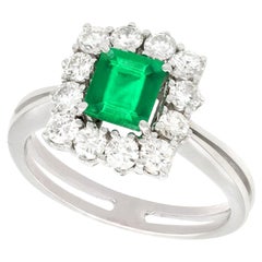 Vintage Emerald Cut Emerald and Diamond White Gold Cluster Ring