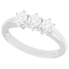 Brilliant Round Cut Diamond and White Gold Trilogy Ring